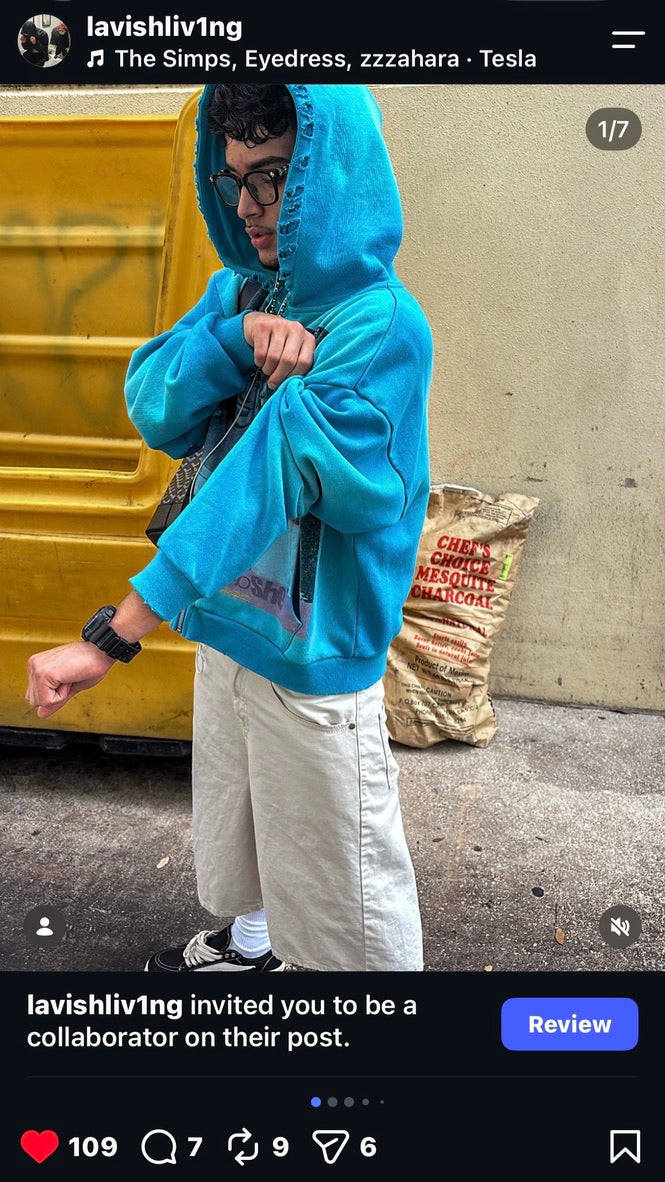 Customer wearing a blue ForeverYoung hoodie