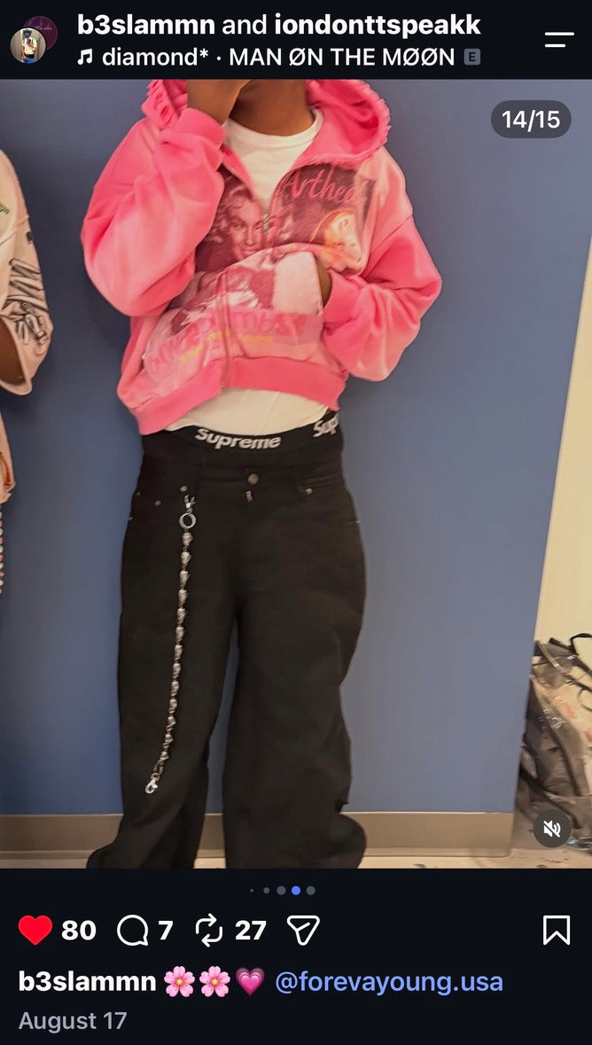 Customer wearing a pink ForeverYoung hoodie