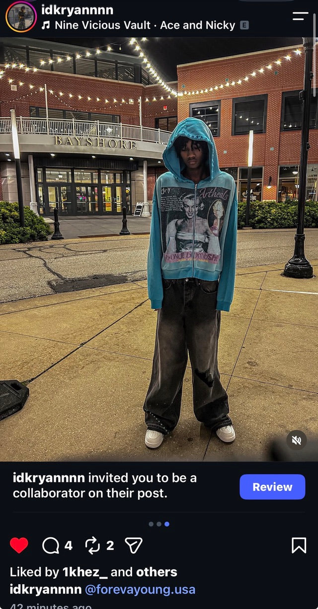 Customer wearing a blue ForeverYoung hoodie